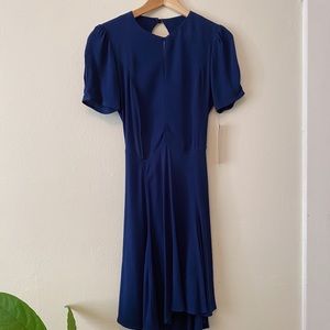 Reformation Henry Dress Size 4
Never worn, NWT